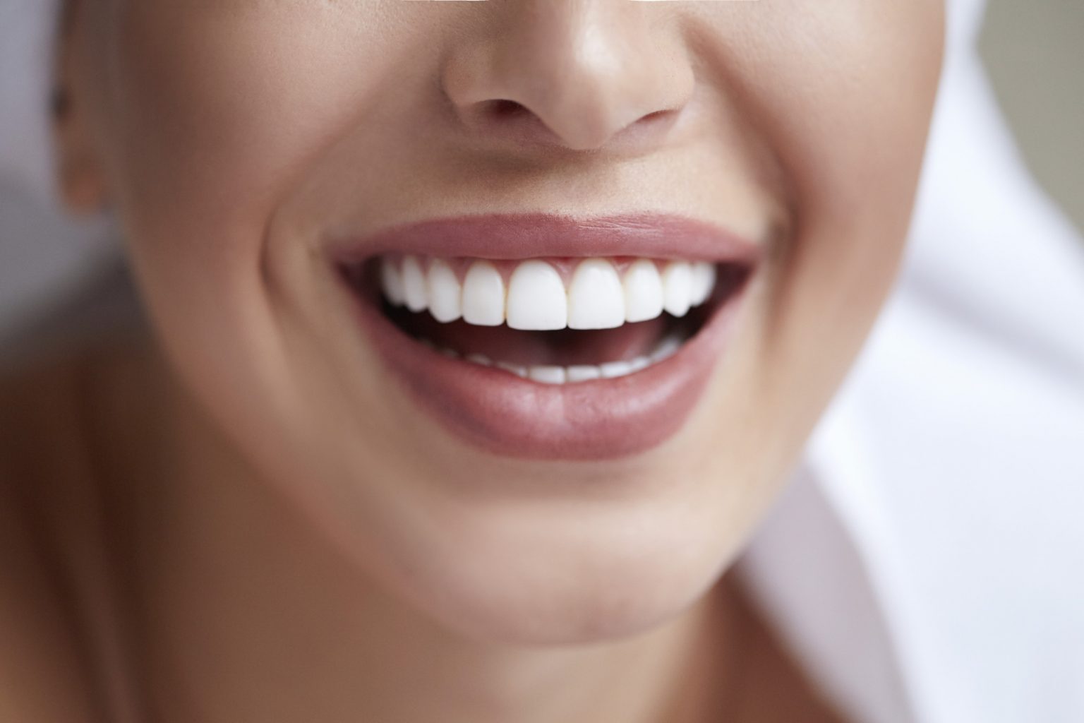Dental Implants vs. Veneers What's the Difference? IVY Rose DDS